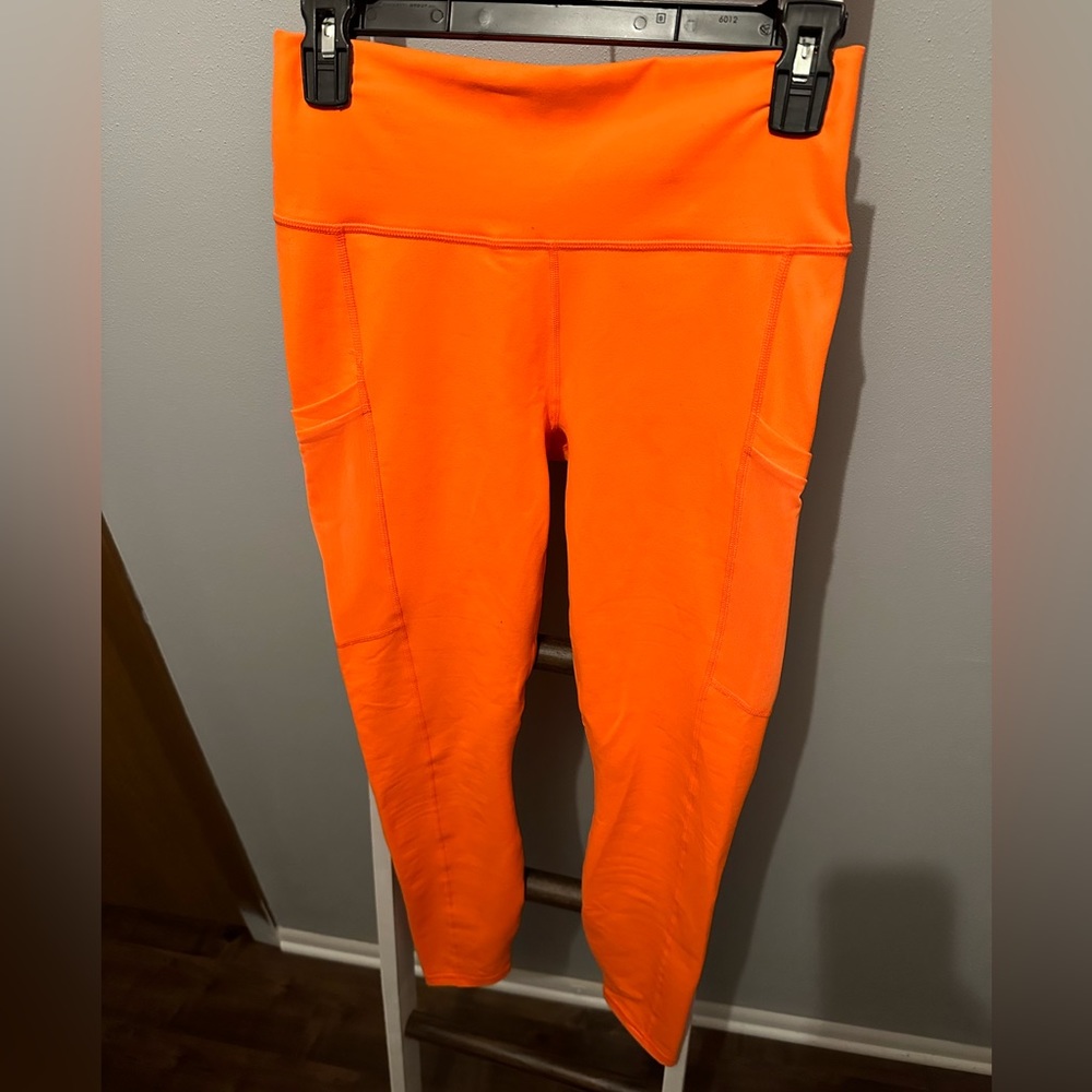 Bright orange size medium Fabletics full-length leggings